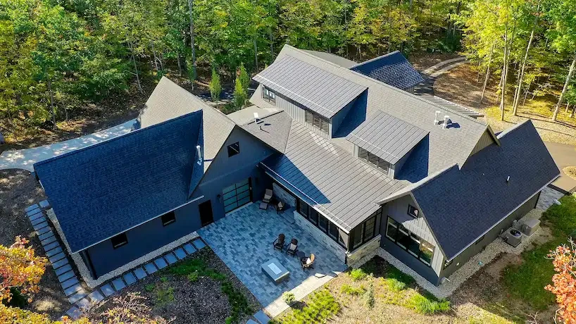 arial view of a newly renovated home in the spring time