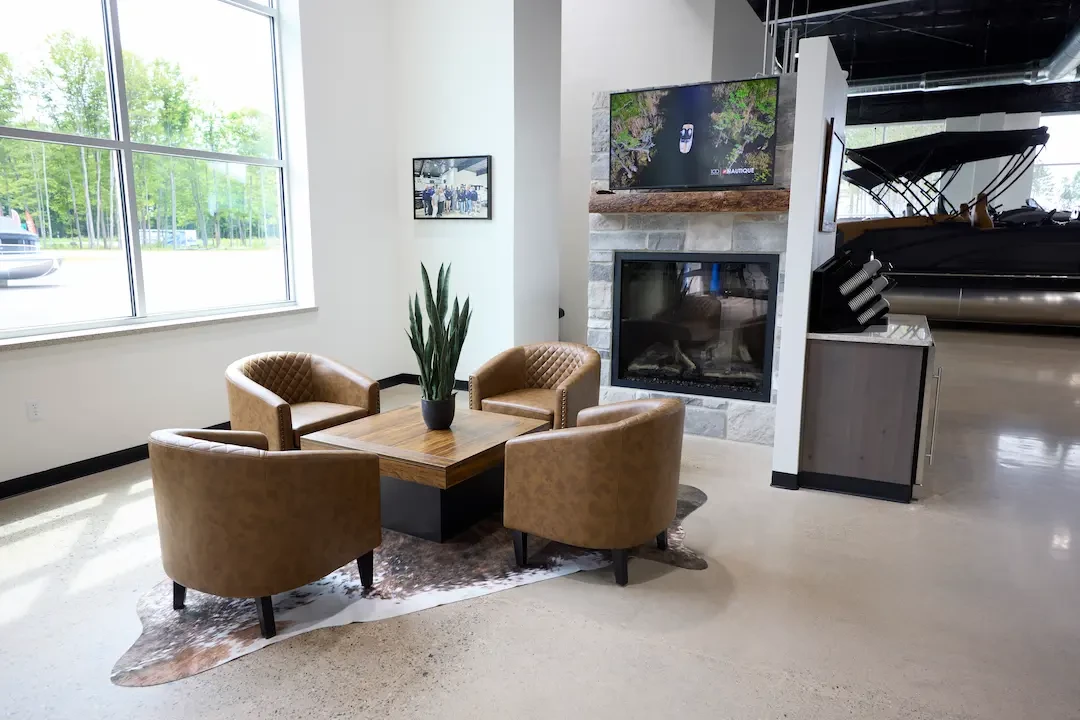 office lobby with light colored shiny tile and a couch